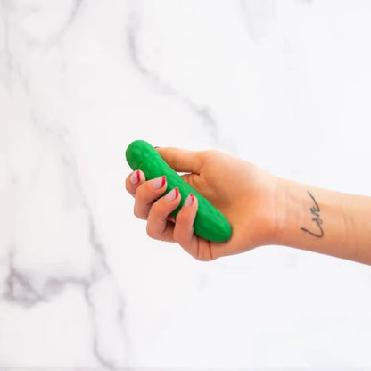 hand holding pickle vibrator