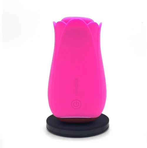 Pink Maia Tulip Pro atop black round charging base