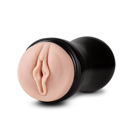soft and wet pocket pussy with pleasure ridges - stroker toy against white background