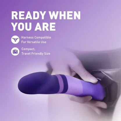 purple rain dildo in harness with purple background