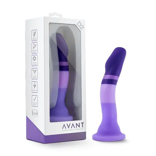 purple rain dildo - white box on left and purple striped dildo on right