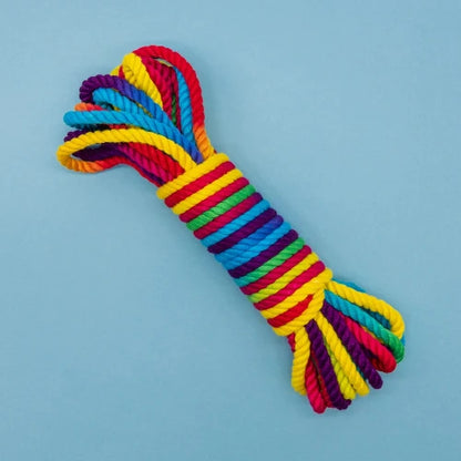 rainbow bondage rope on blue background