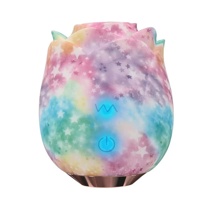 Rainbow rose toy against white background
