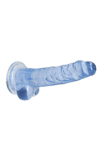 crystal clear blue dildo against white background