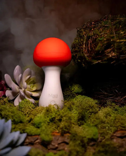 Shroomie Mushroom Vibrator against forrest background