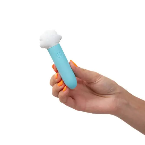 Hand holding STORMEE mini vibrator 