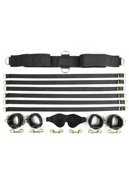 under the bed restraint set - black straps and cuffs against white background