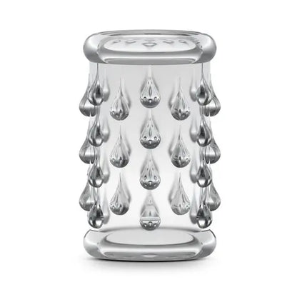 Clear studded penis sleeve against white background