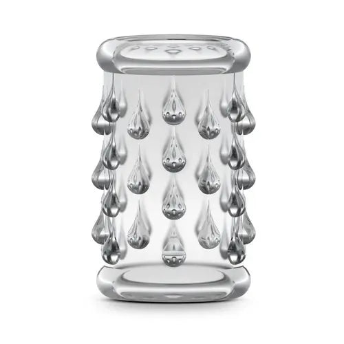 Clear studded penis sleeve against white background