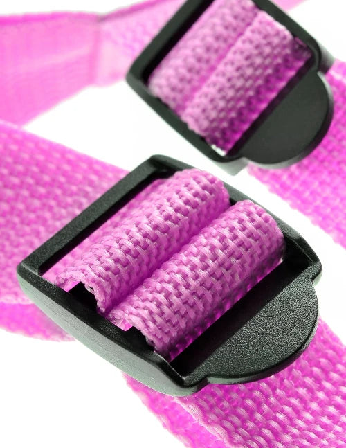 Pink suspender harness close up of adjustable straps