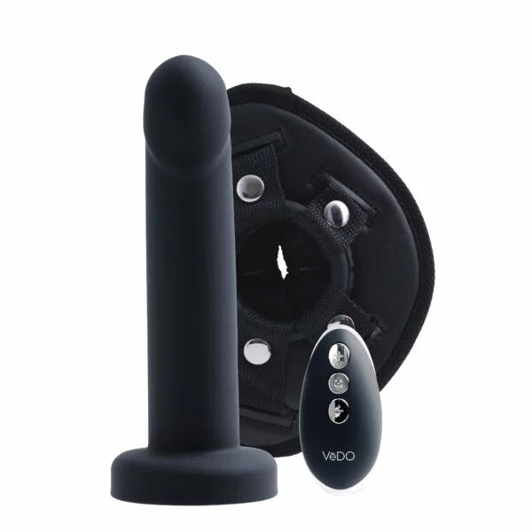 VeDO black vibrator in front of harness fixture with remote control